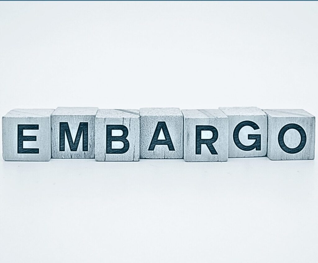 difference between sanctions and embargo